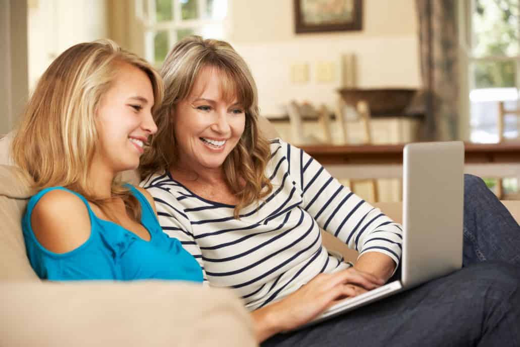 Two women working on a computer