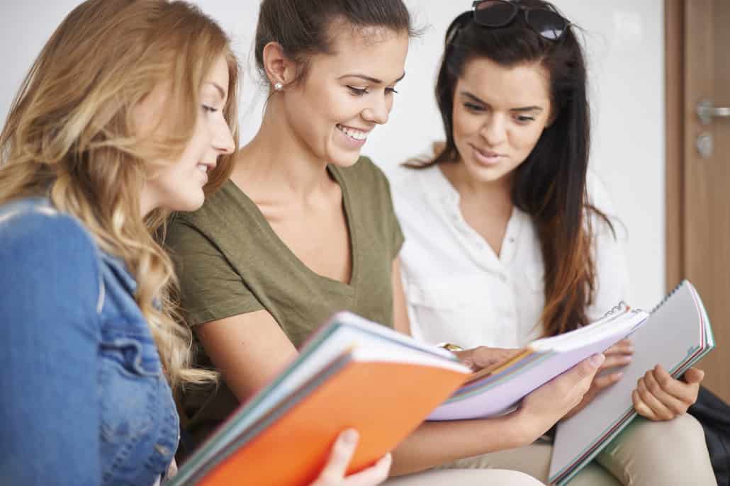 Students comparing notes